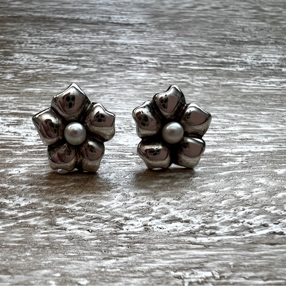 Tiffany & Co. Silver flower with pearl earrings. Gently worn. Circa 1999.